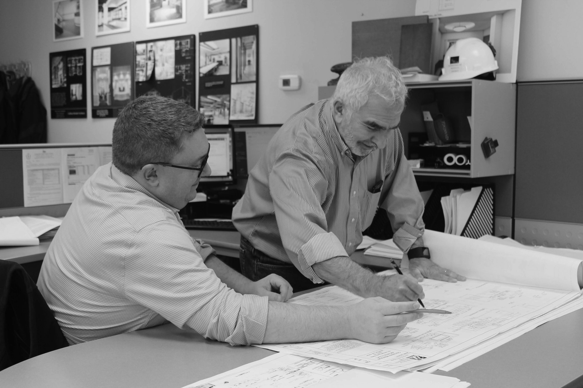 John Matz with Leon Rosenblum reviewing blueprints