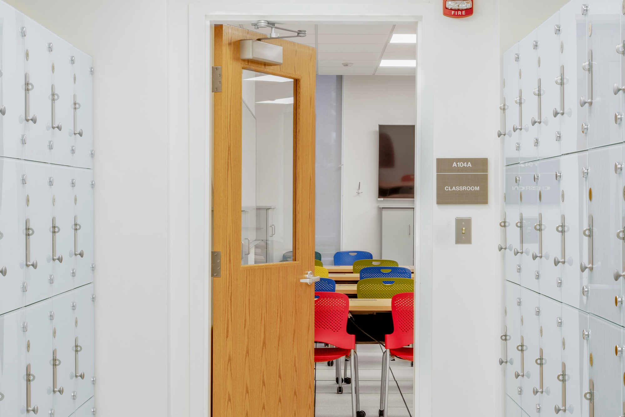 Interior, Lederle Maker Space at UMass Amherst, storage units leading to doorway to classroom area