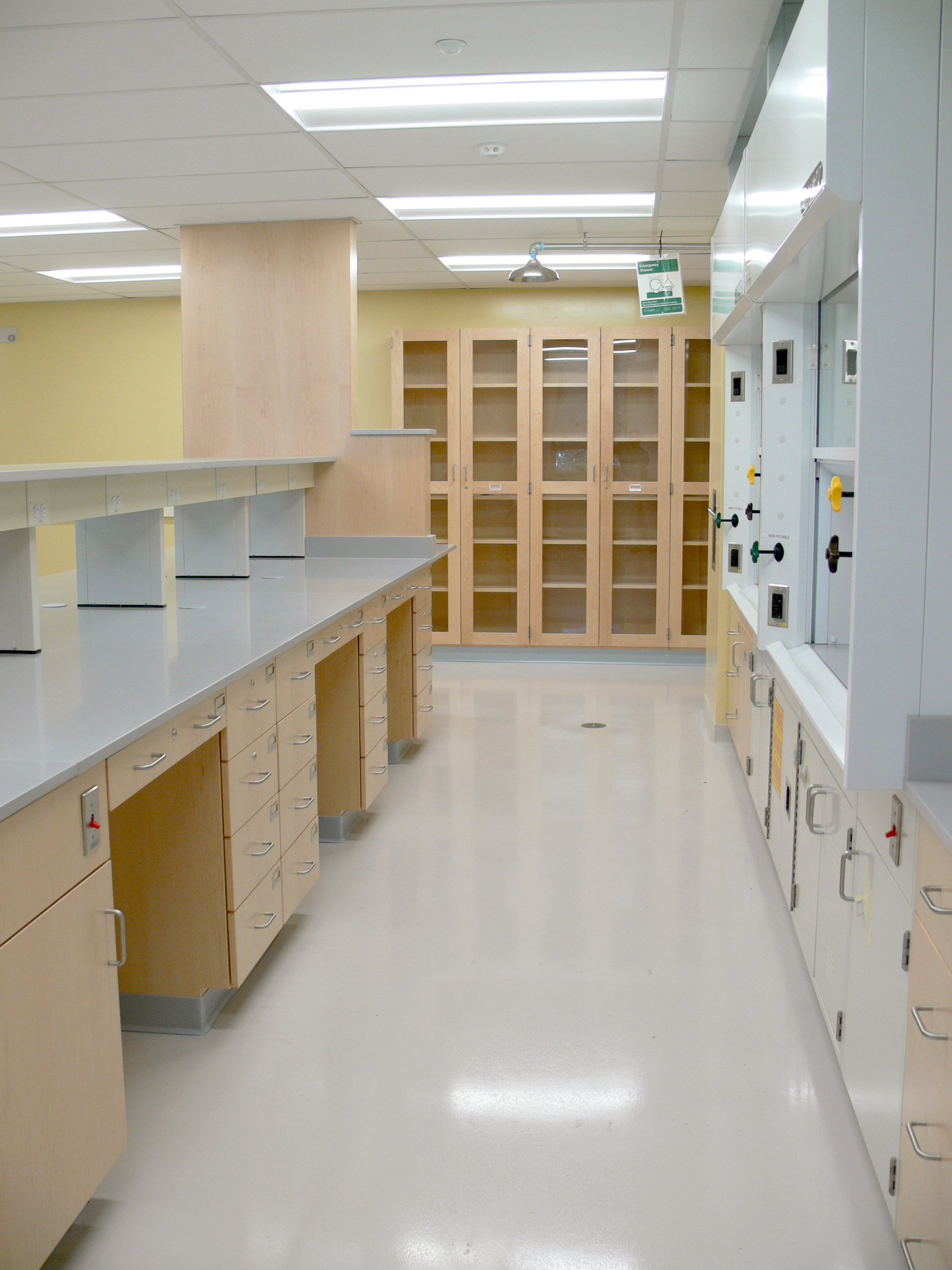 Interior, Olney Research Laboratory at UMass Lowell, workstations, fume hood, storage