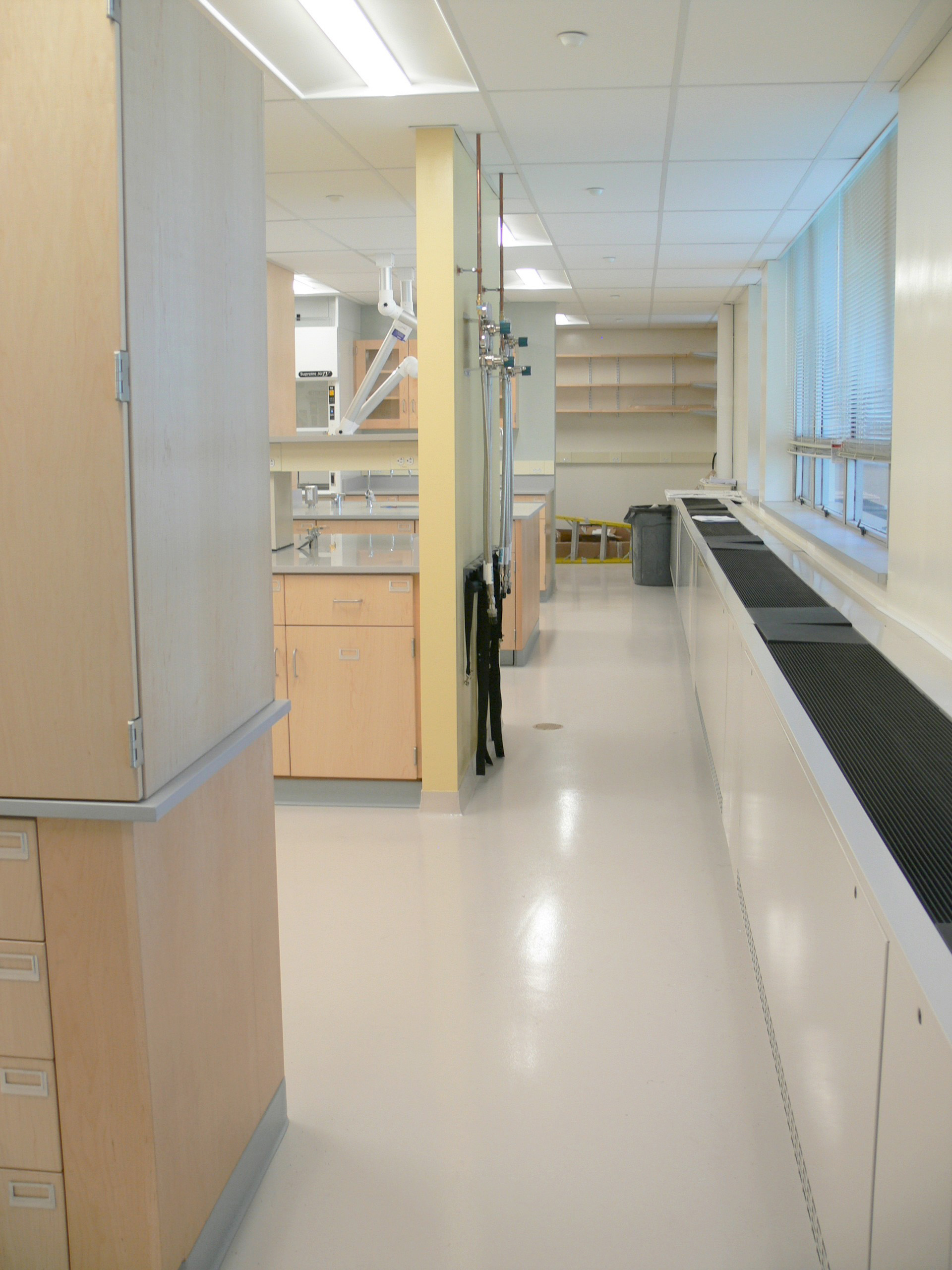 Interior, Olney Research Laboratory at UMass Lowell, workstations, fume hood, storage