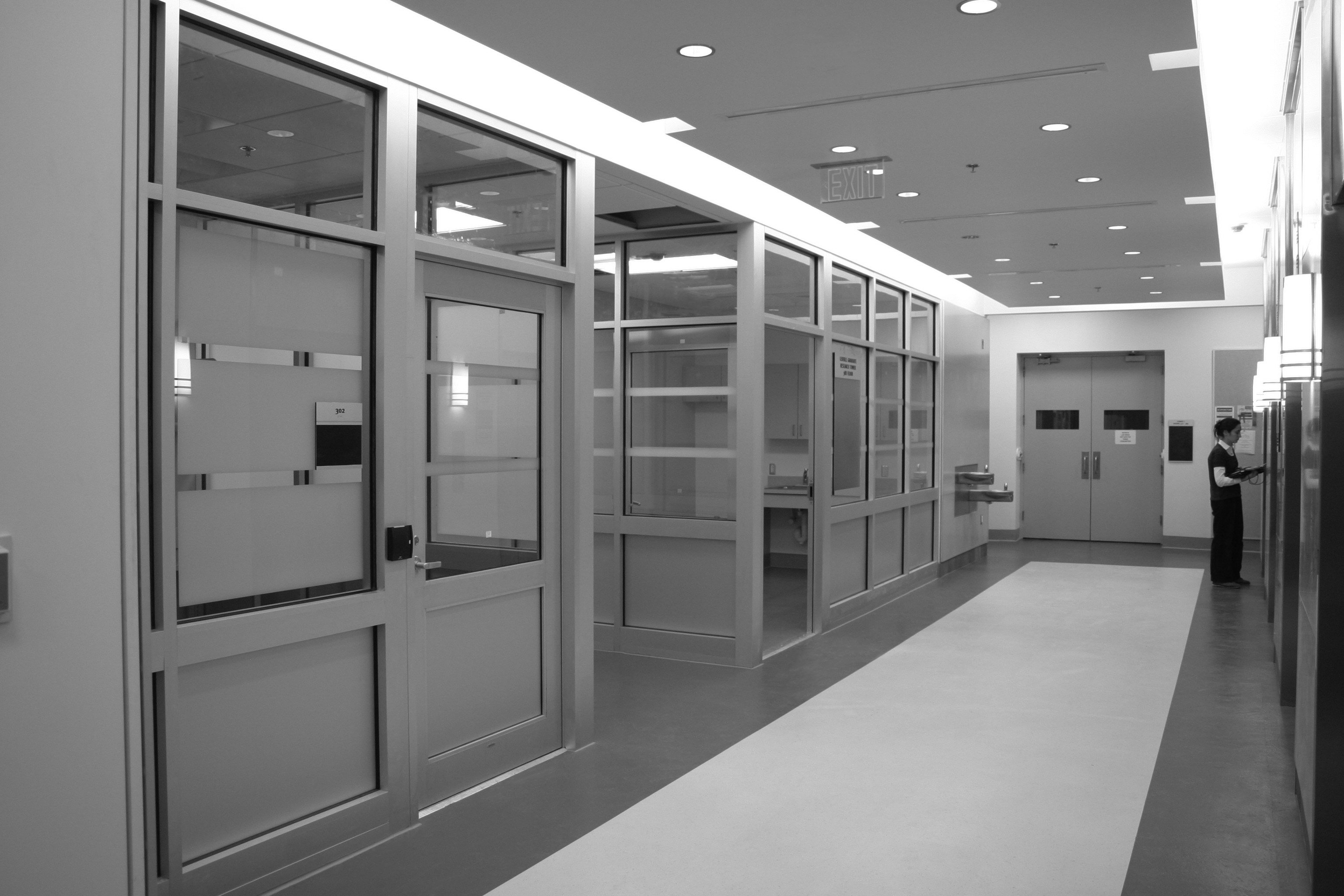 Interior, NIH Interdisciplinary Labs at UMass Amherst, elevator lobby view, person occupying the space