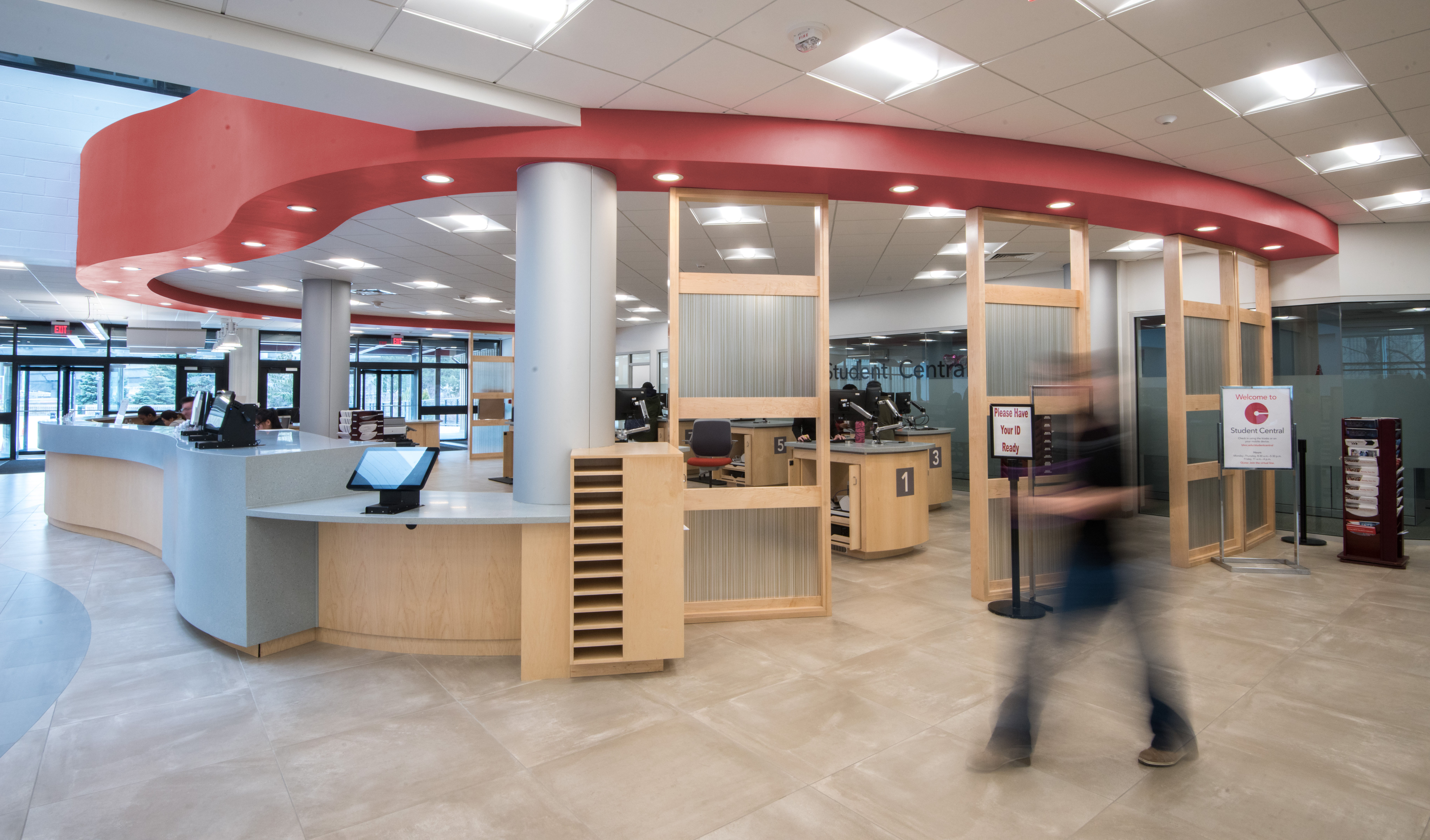 Student Central One Stop at Bunker Hill Community College, student services center area with kiosks