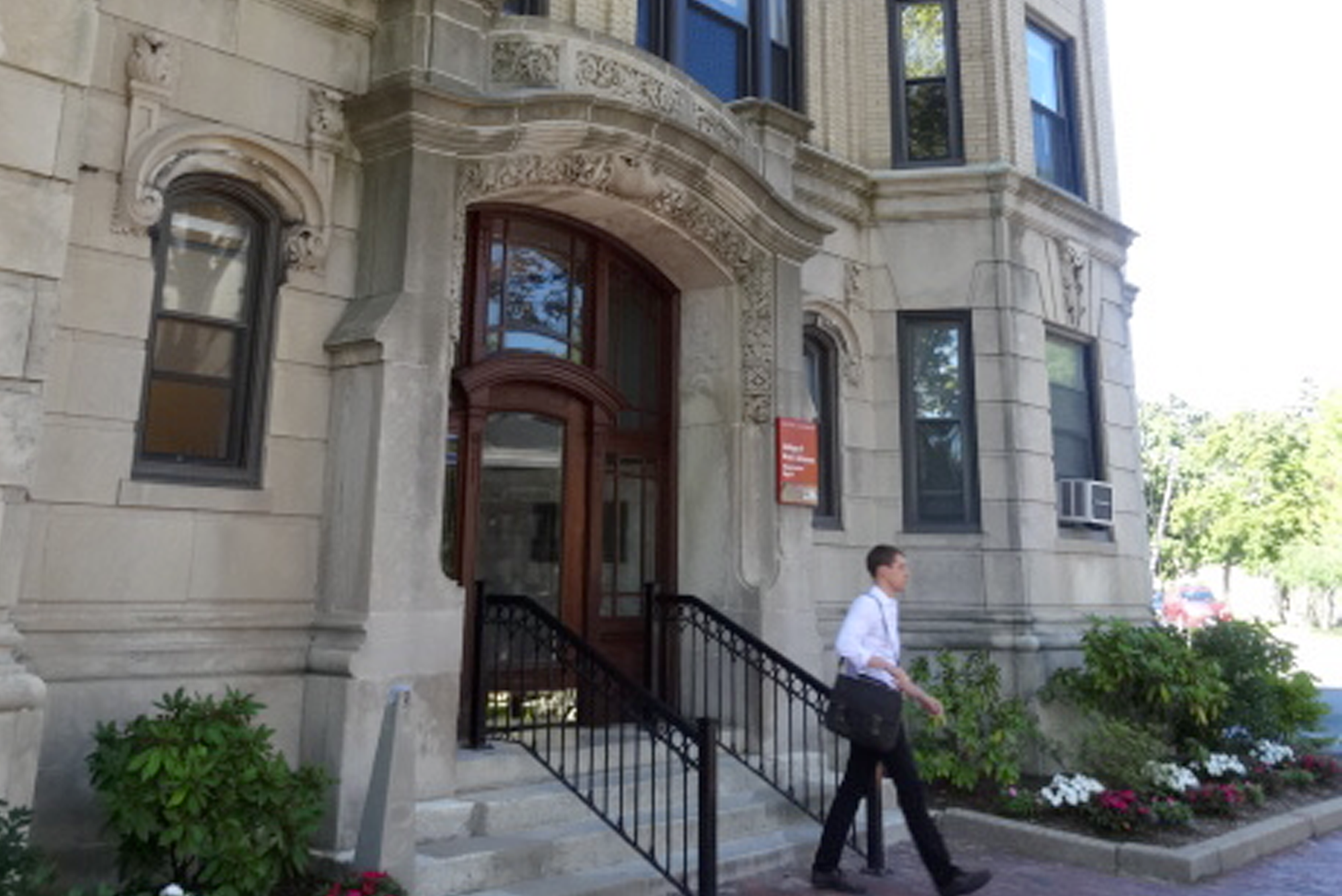 Exterior, English Department Offices at Boston University, street view, staff exiting the building