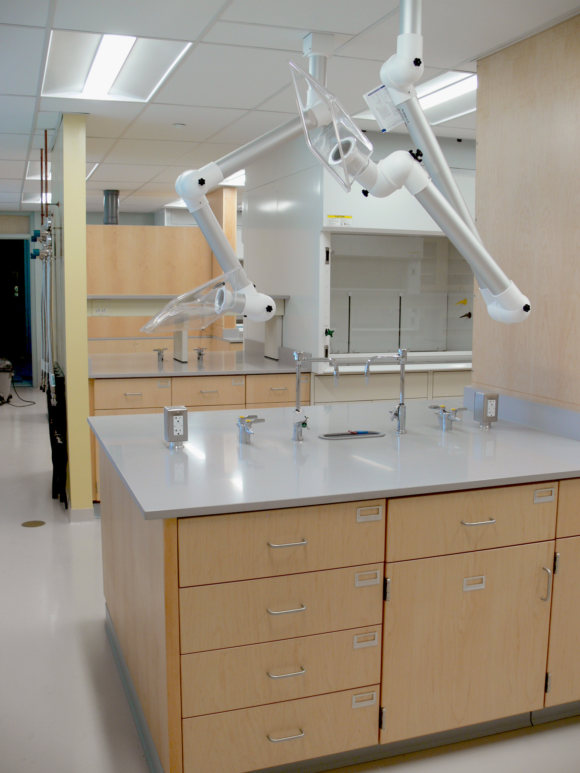 Interior, Olney Research Laboratory at UMass Lowell, workstations, fume hood, ceiling mounted lab fume hood exhaust
