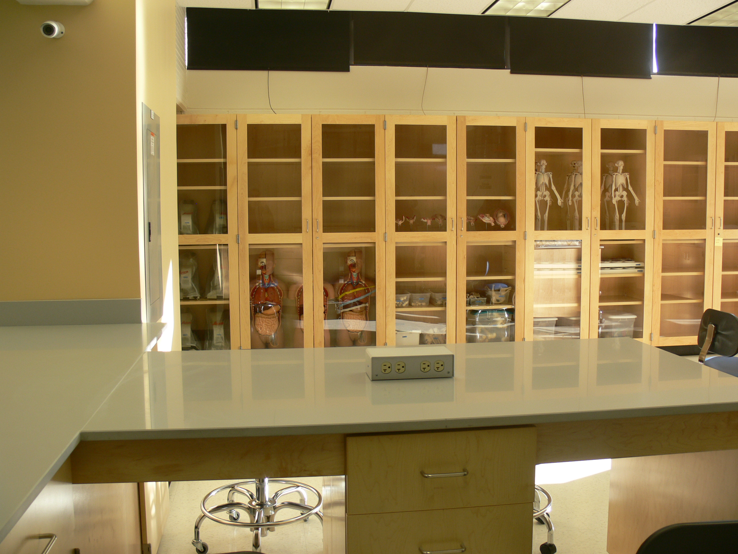 Interior, School of Public Health training laboratory  at UMass Lowell, work station, storage